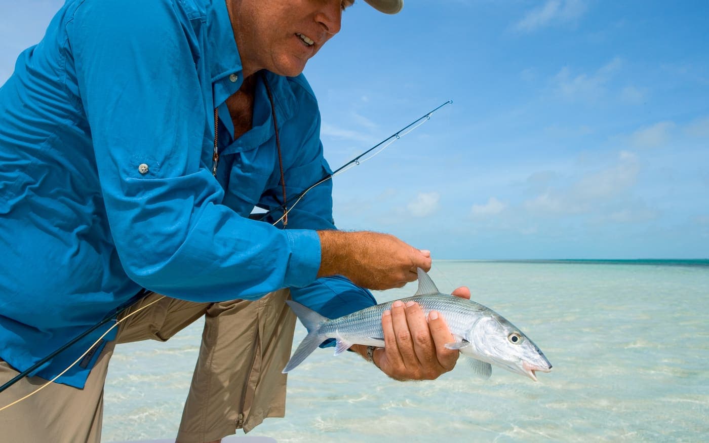Angler with a bonefish on Ragged Island